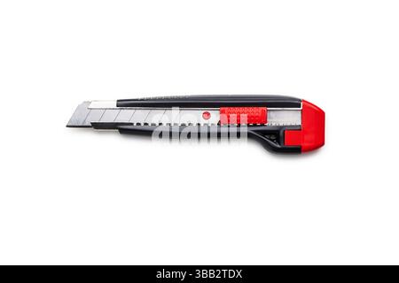 Red and Black Utility Knife with an Extendable Blade on White Background Stock Photo