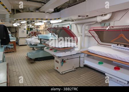 Royal Yacht Britannia, Leith, Scotland. Interior view of laundry room - fitted with original 1950s equipment. Stock Photo