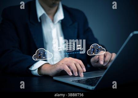 Businessman using cloud computing technology for data transfer and storage. Concept of cloud computing, data security, online storage, network infrast Stock Photo