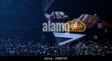 Cybersecurity concept showing hands on laptop with glowing cloud lock icon and digital network background. Ideal for secure data storage, online prote Stock Photo