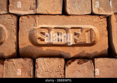 KOLKATA, WEST BENGAL, INDIA - FEBRUARY 20, 2024 hand made local traditional terra cotta bricks Stock Photo