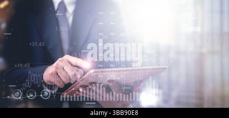 Businessman using digital tablet futuristic financial dashboard. data analyzing report invest strategy planning, stock market growth, investment trend Stock Photo