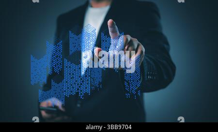 business professional analyzing digital representations of building growth and market trends using futuristic data visualization tools. Stock Photo