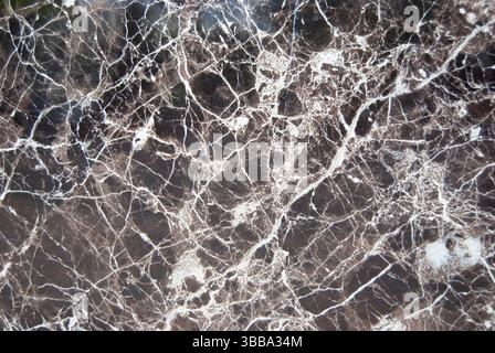 Brown marble surface. Texture of the stone. Grey marble background. Stock Photo