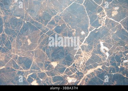 Brown marble surface. Texture of the stone. Grey marble background. Stock Photo
