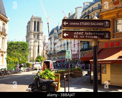 Notre-Dame under restoration in summer, Paris street scene Stock Photo