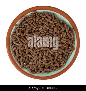 Top view of a bowl filled with chocolate jimmies isolated on a white background. Stock Photo