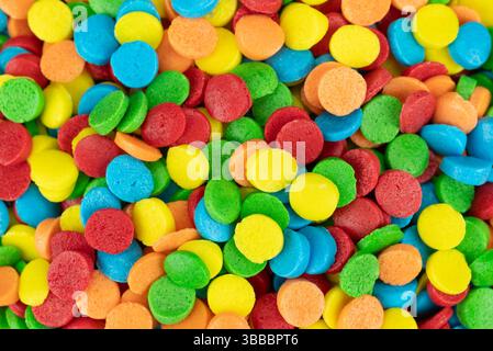 Very close view of colorful round cake sprinkles. Stock Photo