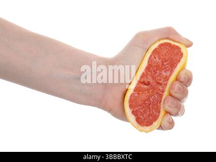 Woman squeezing grapefruit on white background, closeup Stock Photo