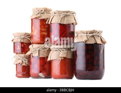 Many jars with different pickled products isolated on white Stock Photo