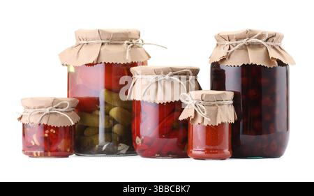 Many jars with different pickled products isolated on white Stock Photo