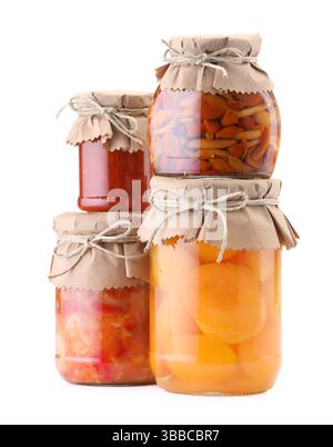 Many jars with different pickled products isolated on white Stock Photo