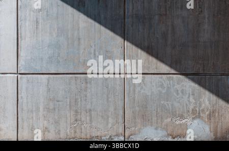 Wall surface made of large concrete blocks Stock Photo