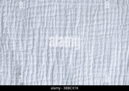 Textured white fabric background with soft folds and subtle linear pattern design Stock Photo