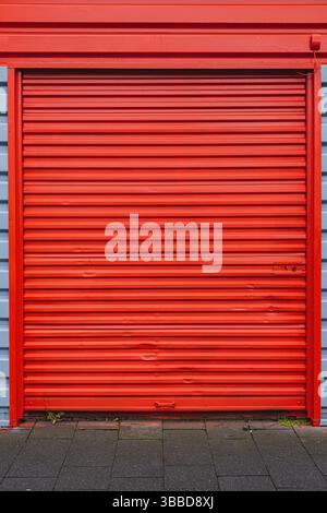 Bright red metallic horizontal striped entrance Stock Photo