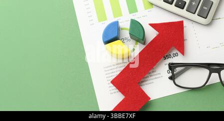 laptop and pen with business charts, graphs, information and reports background for financial and business concepts. High quality photo Stock Photo
