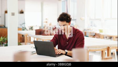 Pottery, creative and man in workshop on laptop for inventory, quality control and checklist of ceramic designs. Business, art studio and person on Stock Photo