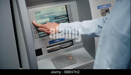 ATM User Entering PIN Code on Keypad, Choosing Cash Withdrawal Transaction, Entering Amount and Taking Money from Cash Dispenser. Automated Teller Machine, Banking System and Operations. Close Up. Stock Photo