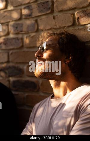 Portrait of a young bearded smiling man Stock Photo