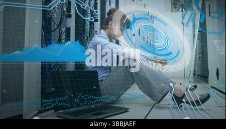Image of clock and data processing over man using computer Stock Photo