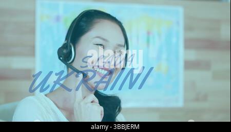 Image of text over asian businesswoman using phone headset Stock Photo
