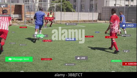 Social media concept icons over team of diverse male soccer players playing soccer on sports field Stock Photo