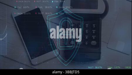 Image of graphs and digital padlock over smartphone with copy space and payment terminal Stock Photo