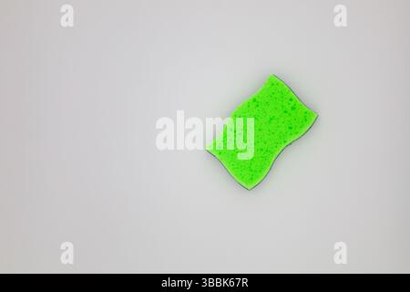 Green sponge in different positions and conditions Stock Photo