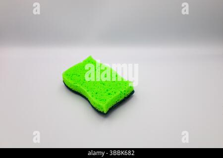 Green sponge in different positions and conditions Stock Photo