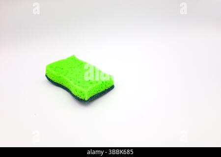Green sponge in different positions and conditions Stock Photo