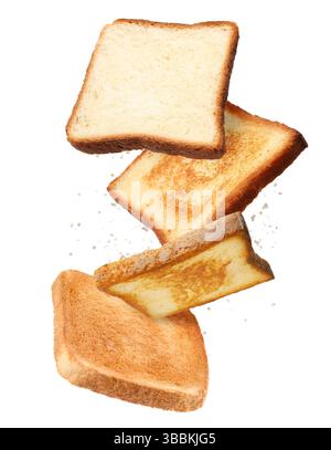 Pieces of fresh toast bread falling on white background Stock Photo