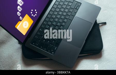 Online documentation database. Laptop with document management system DMS concept on screen. File Transfer Protocol Secure. Internet cloud technology Stock Photo