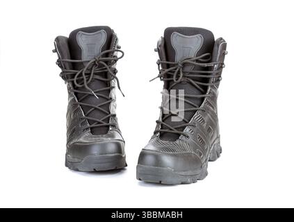 A black hiking boots with rugged design, front view, isolated on white background. these durable boots feature sturdy laces and high ankle for support Stock Photo