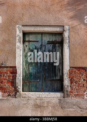 a rustic window of a Murano house Stock Photo