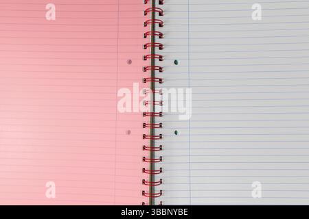 Spiral bound lined notebook with light pink page. High quality photo Stock Photo
