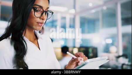Woman, developer and typing on stylus in office for IT, coding software and server update. Female person, tablet and testing app for online Stock Photo