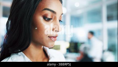 Woman, programmer or developer with research at office for future development or cybersecurity. Female person, designer or coder with vision for AI Stock Photo