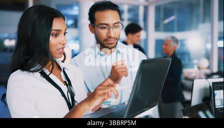 People, explain and developer on laptop in office of programming, coding training and check server. Team, mentor and helping for app testing, IT Stock Photo