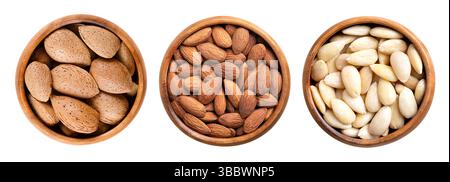 Almonds in shell, shelled and skinless, in wooden bowls. On the left unshelled, in the center shelled, and blanched almonds on the right side. Stock Photo