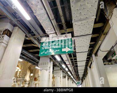 Signboard Meca Mecca, Saudi Arabia, June 20 2024: Mobility scooter service signboard ...