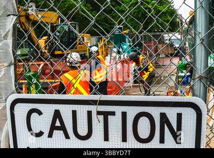 Workers on a street construction site Stock Photo