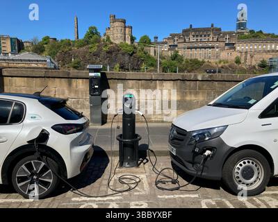 Electric vehicle EV Car charging point on street, East Market Street, Edinburgh Scotland Stock Photo