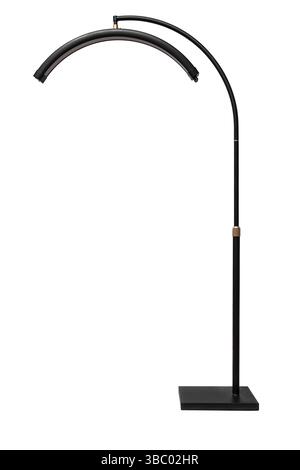 Tall black arc floor lamp with curved LED light and square base, isolated on white. Stock Photo