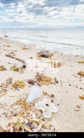 Plastic garbage on tropical beach, selective focus. Stock Photo