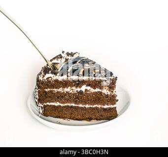 chocolate cake piece on white saucer,  isolated Stock Photo