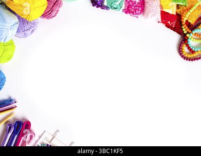 Craft supplies for handmade border on white background. Top view with copy space. Organizing DIY craft elements Stock Photo