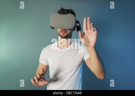 Man using virtual reality glasses for virtual shopping. Augmented reality Stock Photo
