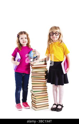 Two high school girls standing in school corridor Stock Photo - Alamy