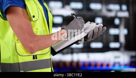 Woman Engineers Inspect Construction Site For Safety With OSHA Guidelines. Stock Photo