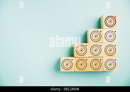 wooden cubes featuring goal and contextual advertising icons Stock Photo